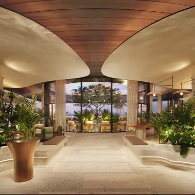 Entrance to luxury all-day dining restaurant with indoor-outdoor design