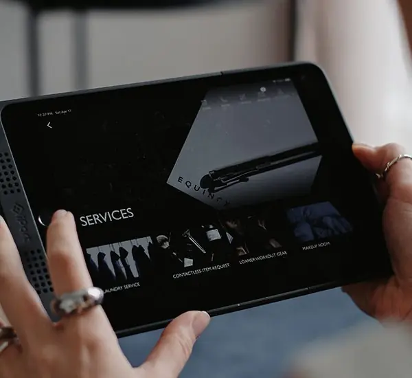 Equinox digital concierge and guest services tablet experience