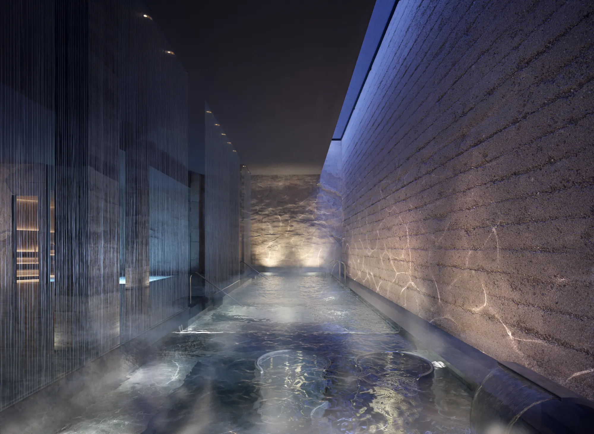 Nighttime wellness spa pool with calming blue ambient lighting
