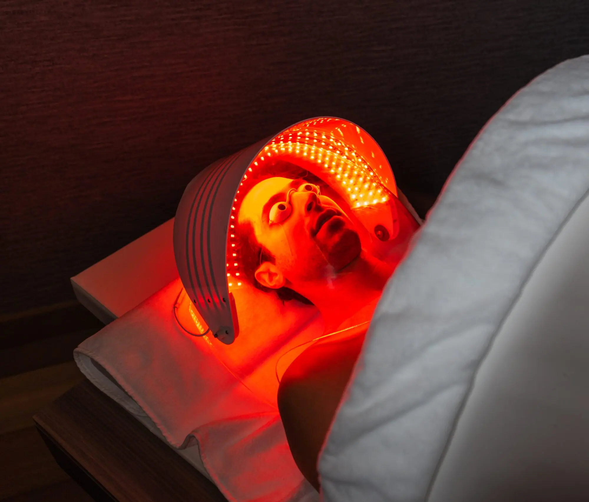 Red light facial therapy treatment for skin recovery and wellness