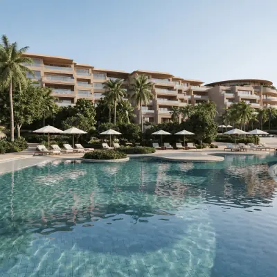 Luxury resort pool with beachfront hotel view