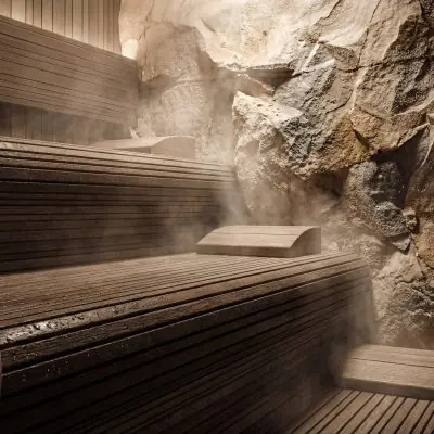 Luxury steam sauna with wooden seating