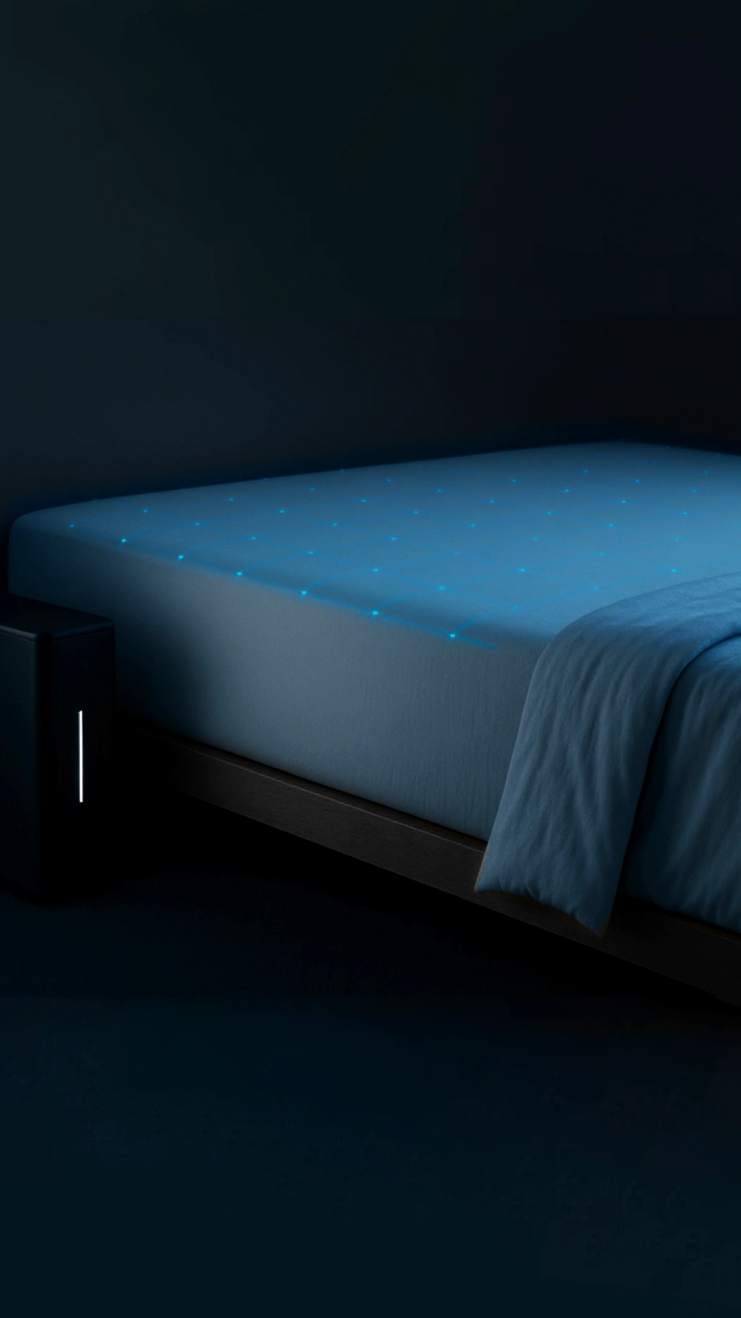 Modern bedroom with glowing smart mattress showing grid of illuminated dots, light blue blanket and sleek black nightstand with vertical light strip