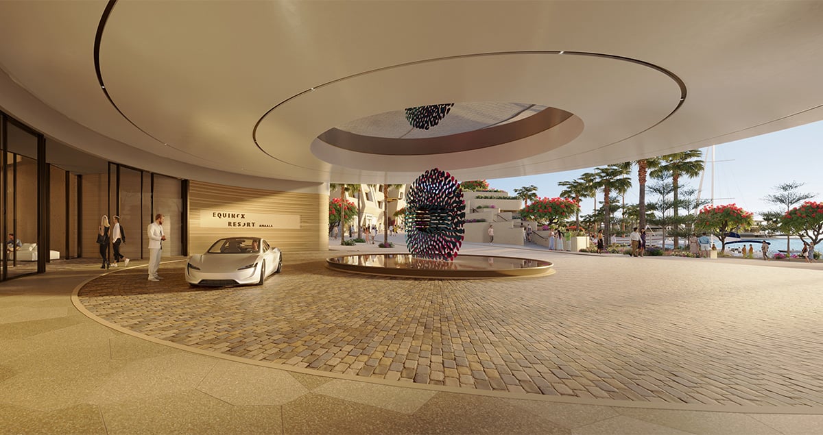 Entrance of Equinox Resort Amaala with abstract sculpture over water feature, white car, and waterfront view