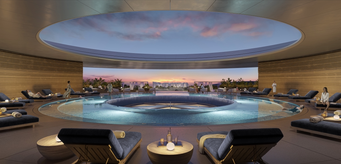 Equinox Amaala indoor pool with central skylight opening to sunset sky, star-patterned floor, cabanas, and guests in robes