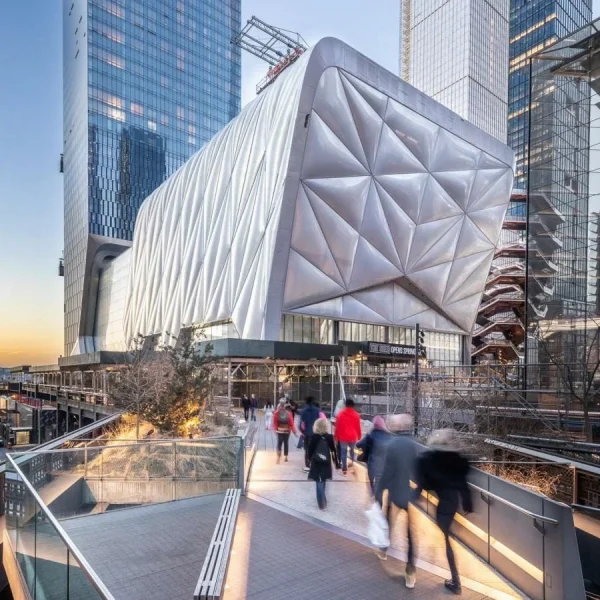 The Shed at Hudson Yards with quilted metallic shell, glass towers, and public walkway near The Vessel