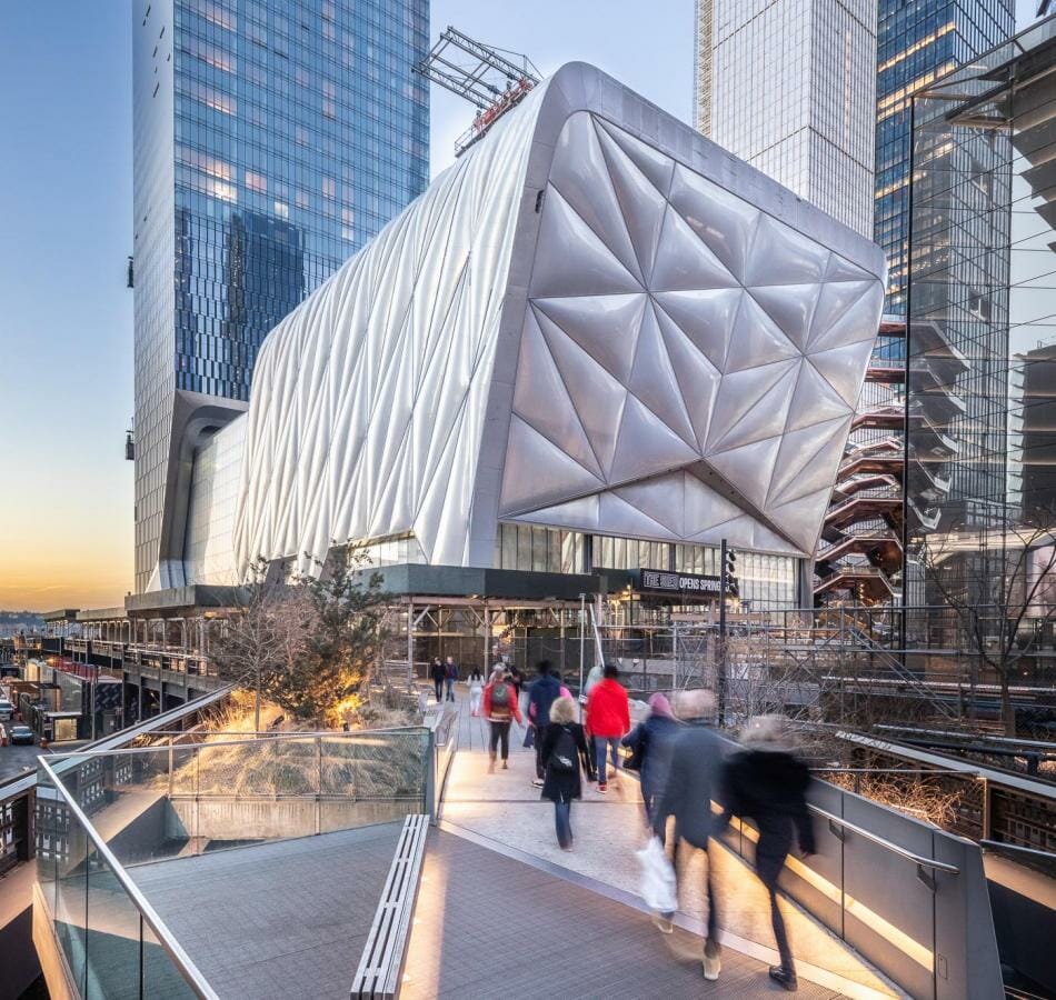 The Shed at Hudson Yards with quilted metallic shell, glass towers, and public walkway near The Vessel