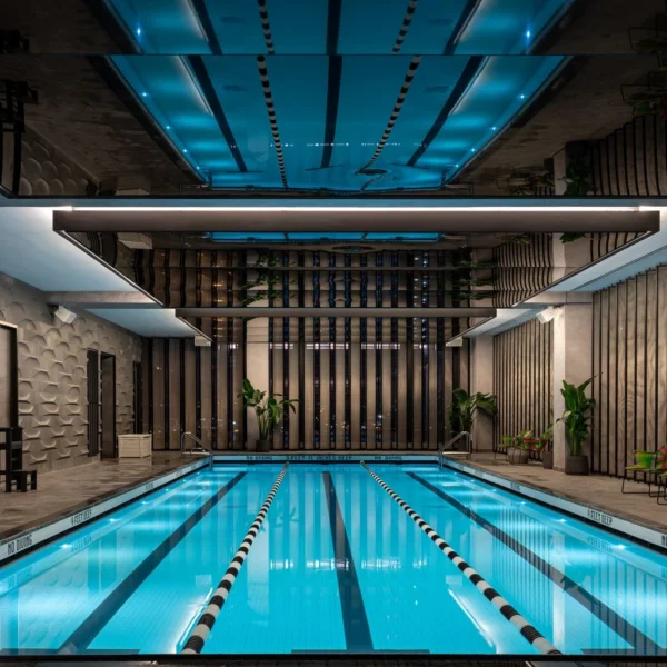 Indoor magnesium pool with soft lighting, elegant design, and wellness-focused atmosphere.